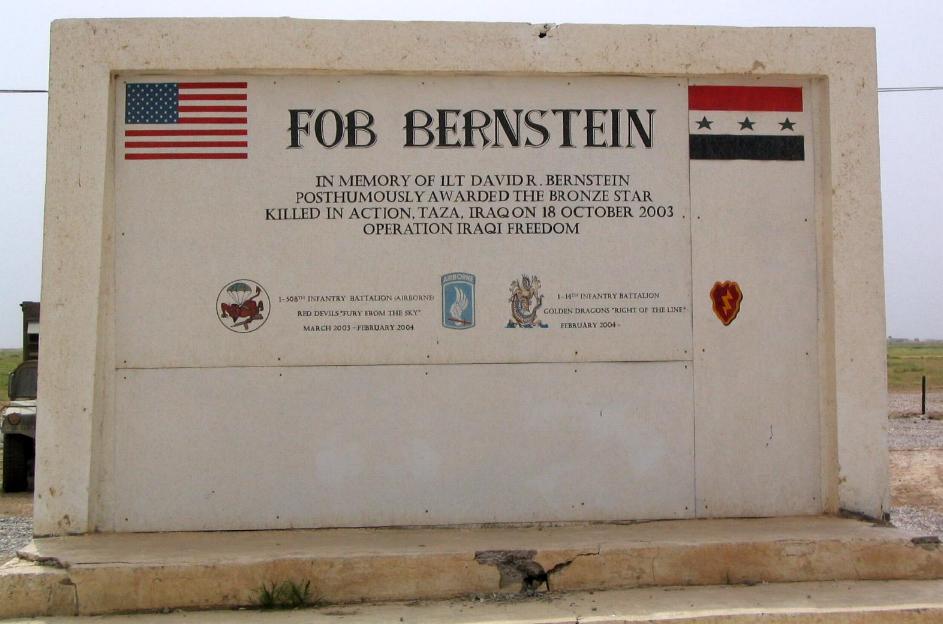 Photograph of a memorial to a fallen American hero in Iraq. Photograph by an American soldier of C Co, 1/252 Army Reserve Battalion. 